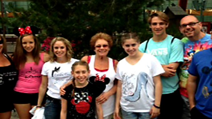 Sandy Taradash and her grandchildren at Disneyland, Anaheim, CA. Sandy says she bought each of them a t-shirt that matches their personality.