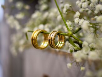 close up photo of gold wedding rings